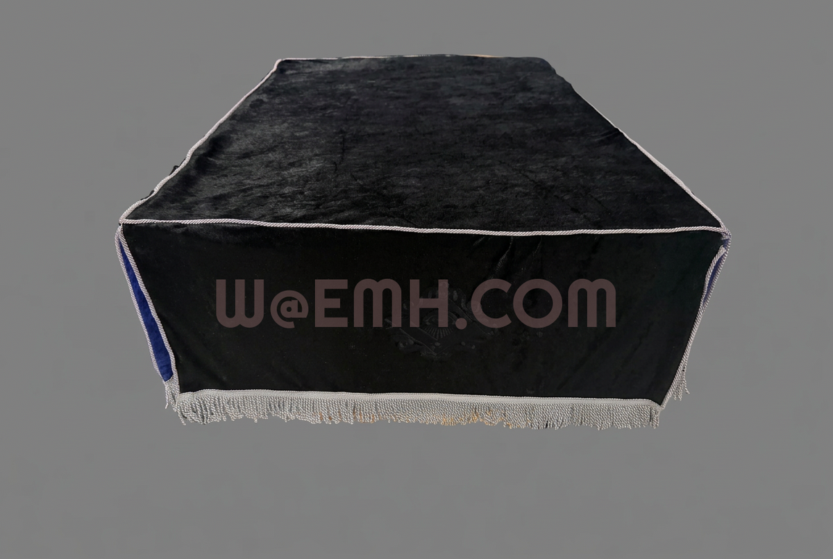 Black reverse of Masonic altar cloth with silver fringe on medium gray.