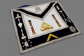 Tennessee Master’s lodge apron on a medium grey background